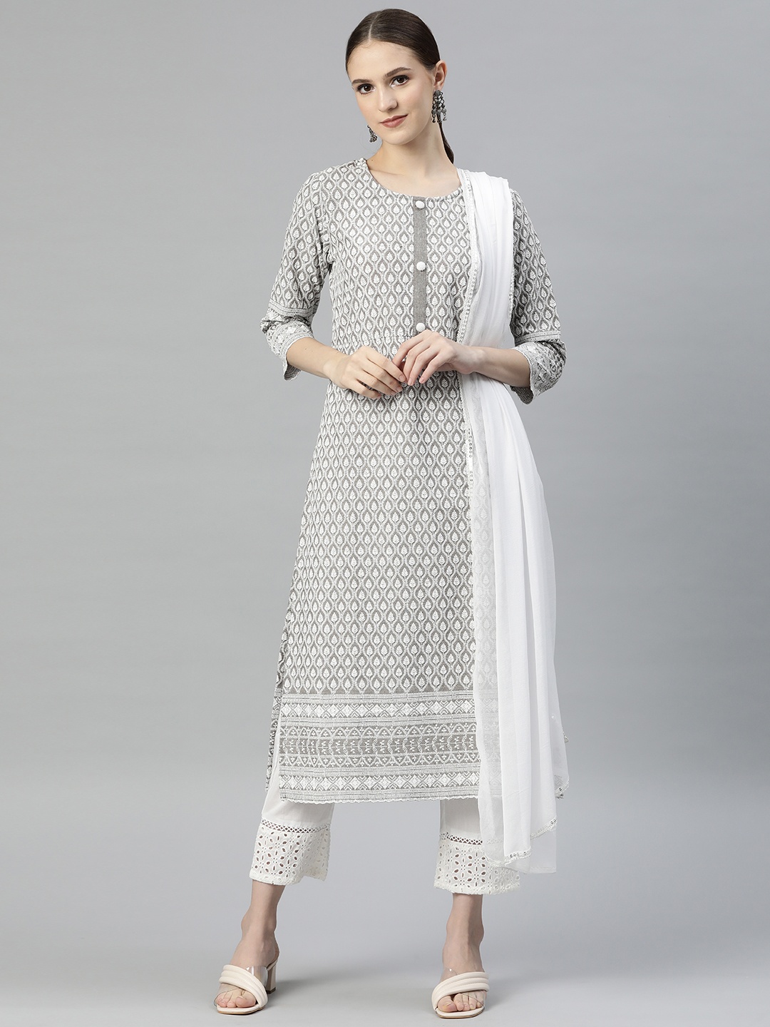 

Readiprint Fashions Women Taupe Ethnic Motifs Embroidered Kurta with Trousers & With Dupatta