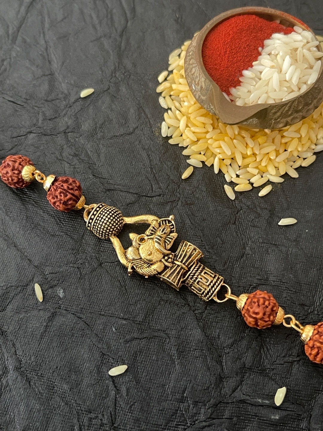 

Digital Dress Room Men Gold-Plated Coffee Brown Rudraksha Beaded Rakhi