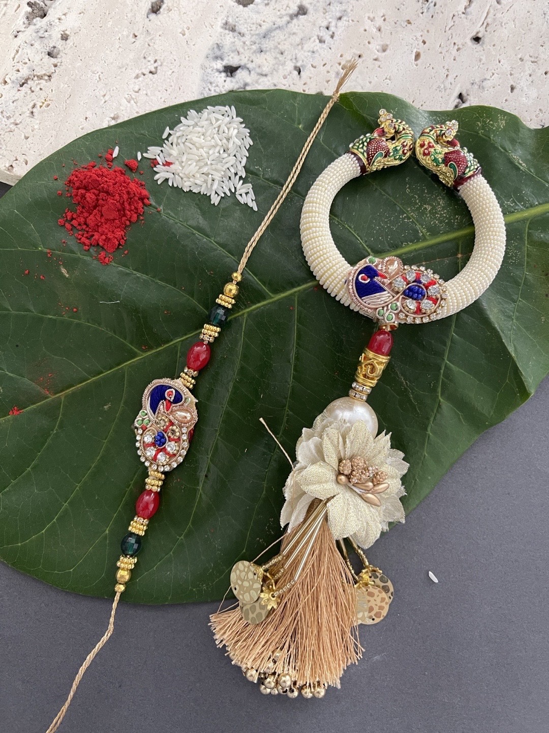 

Digital Dress Room Pack of 2 Cream & Gold-Toned Rakhis