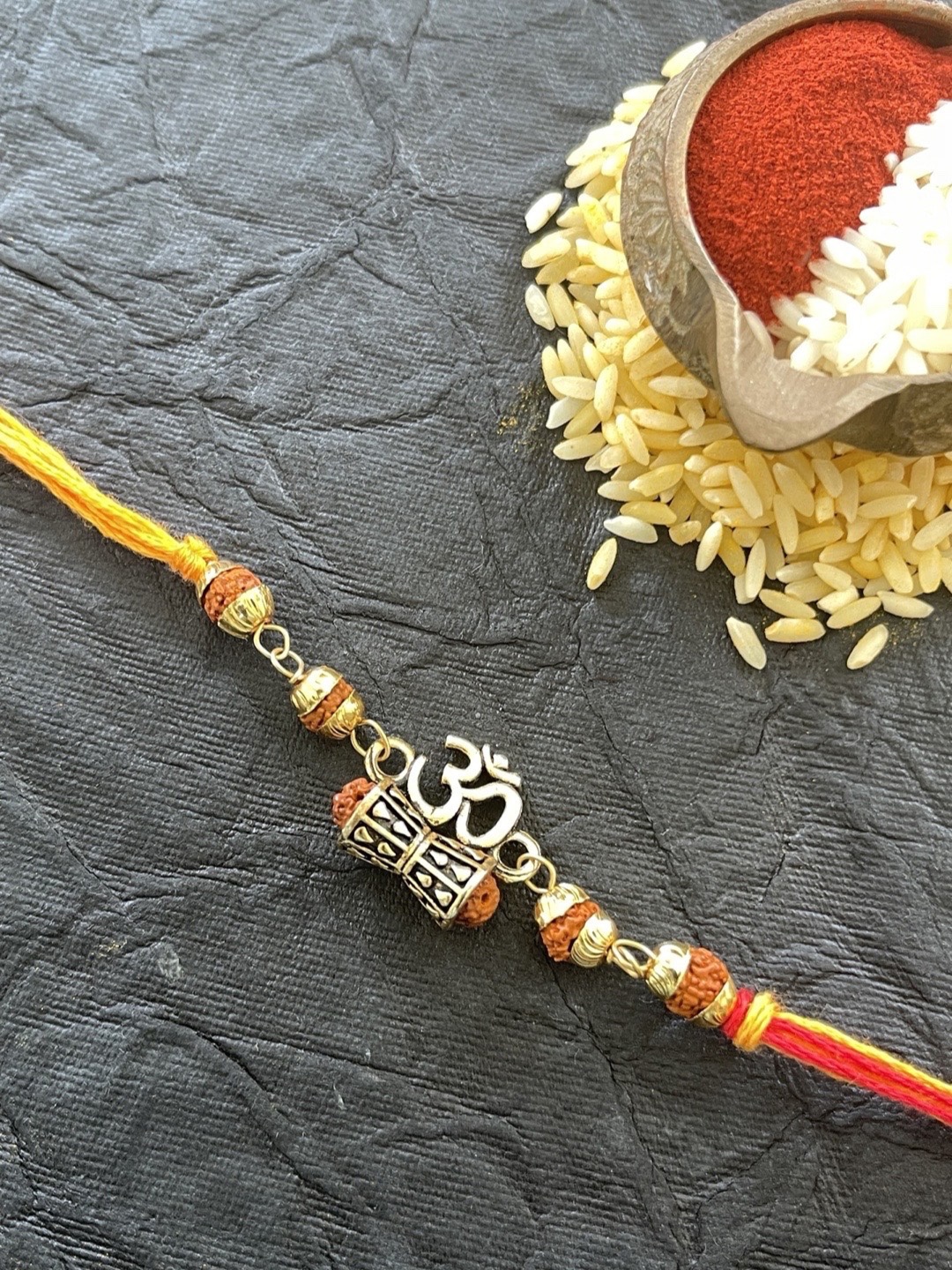 

Digital Dress Room Men Red & Golden Beaded Rakhi