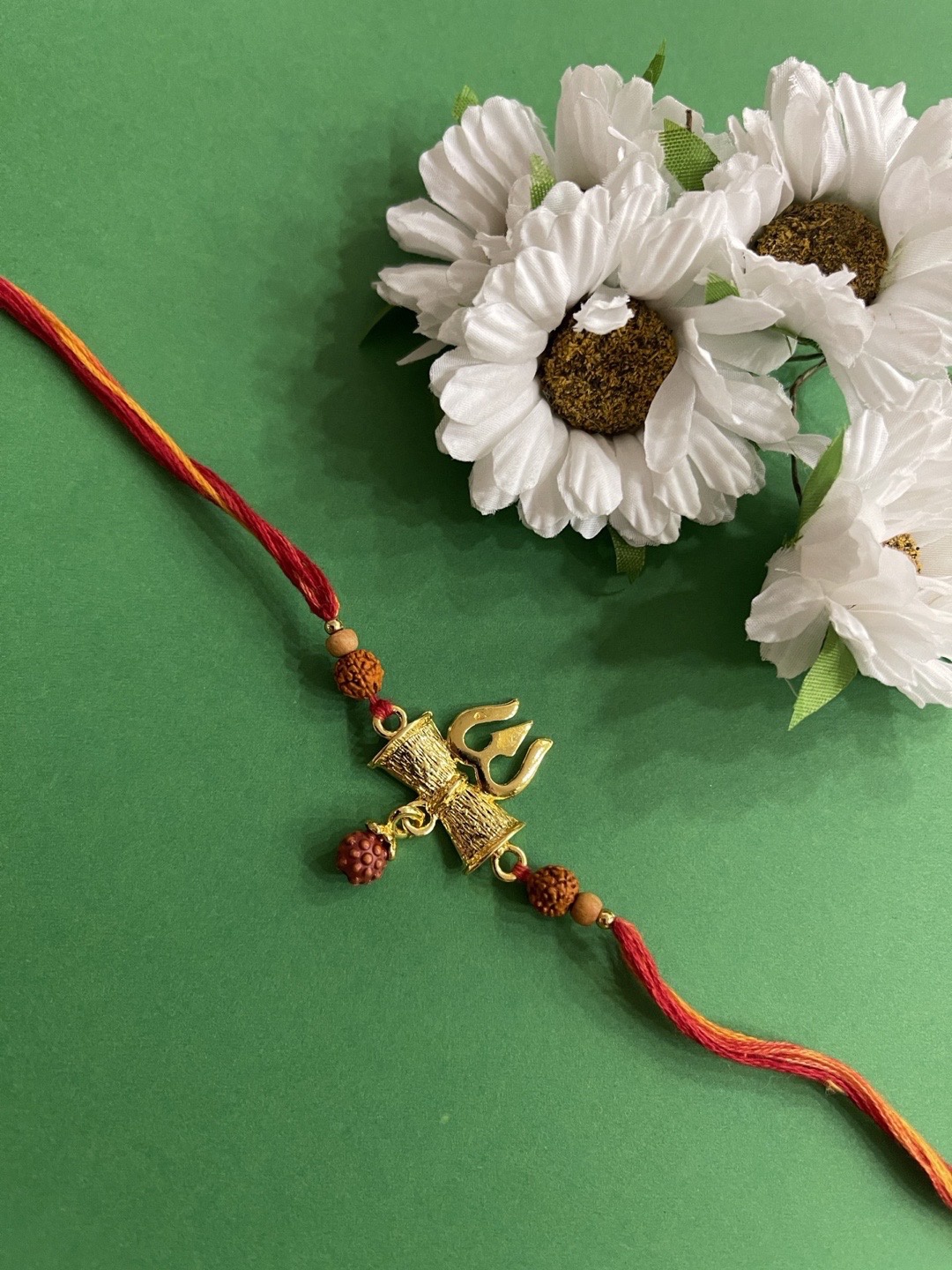 

Digital Dress Room Men Red & Golden Beaded Rakhi