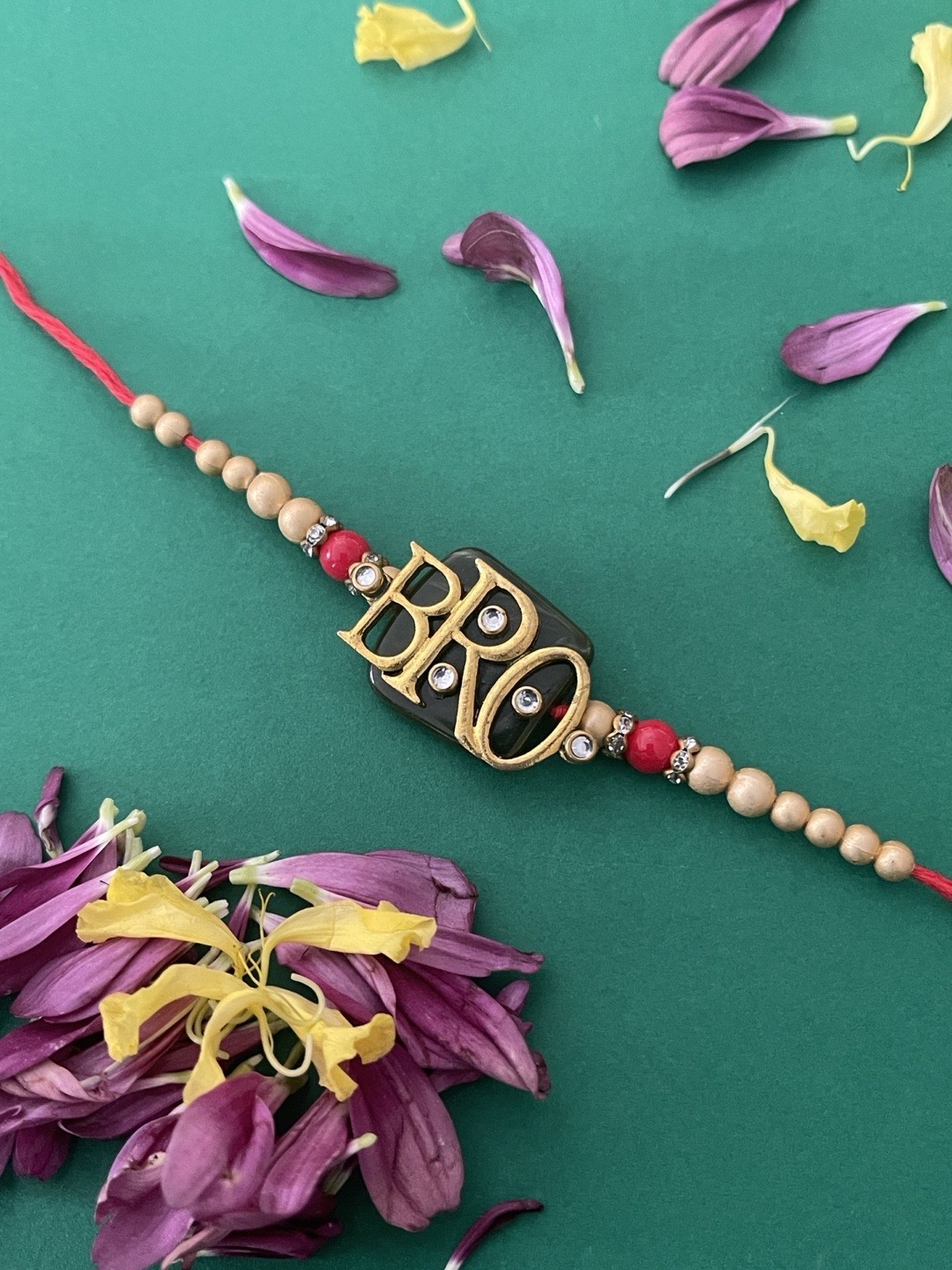 

Digital Dress Room Men Red & Golden Beaded Rakhi