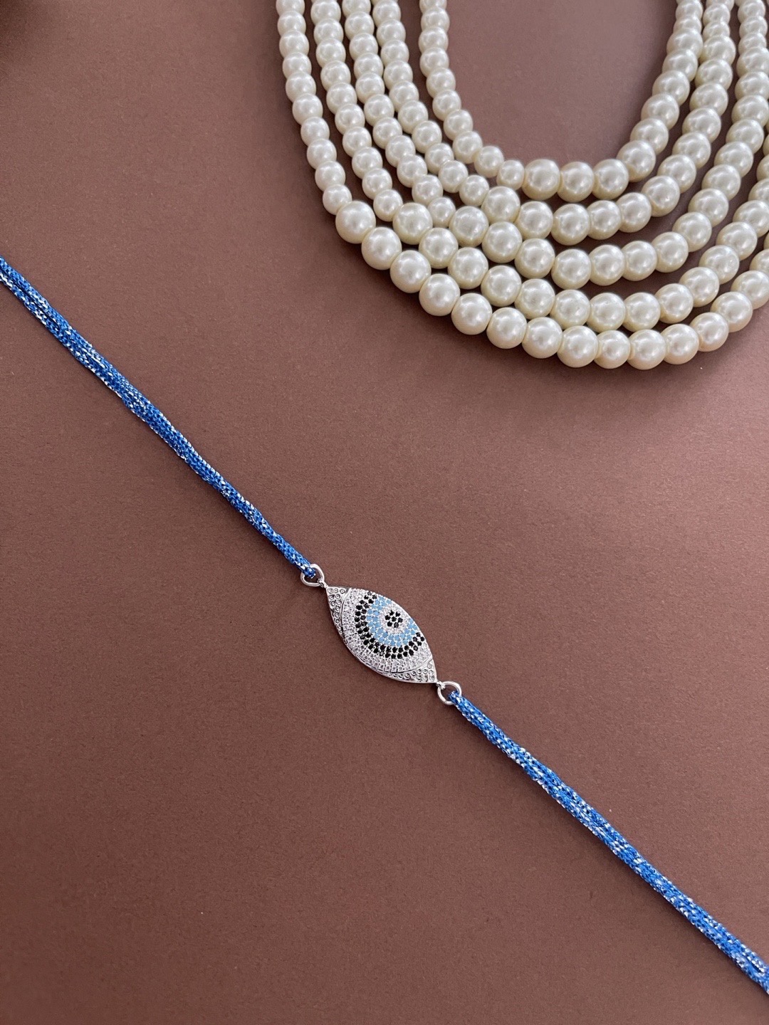 

Digital Dress Room Men Silver-Plated Blue Evil-Eye AD Studded Rakhi