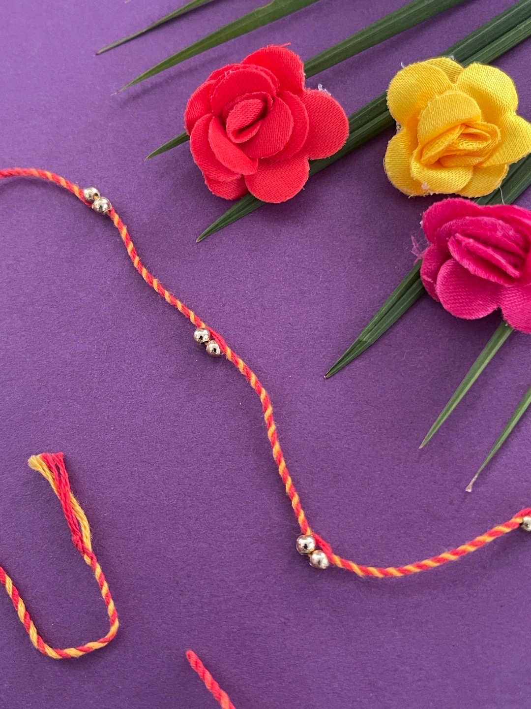 

Digital Dress Room Men Orange Golded Beaded Rakhi