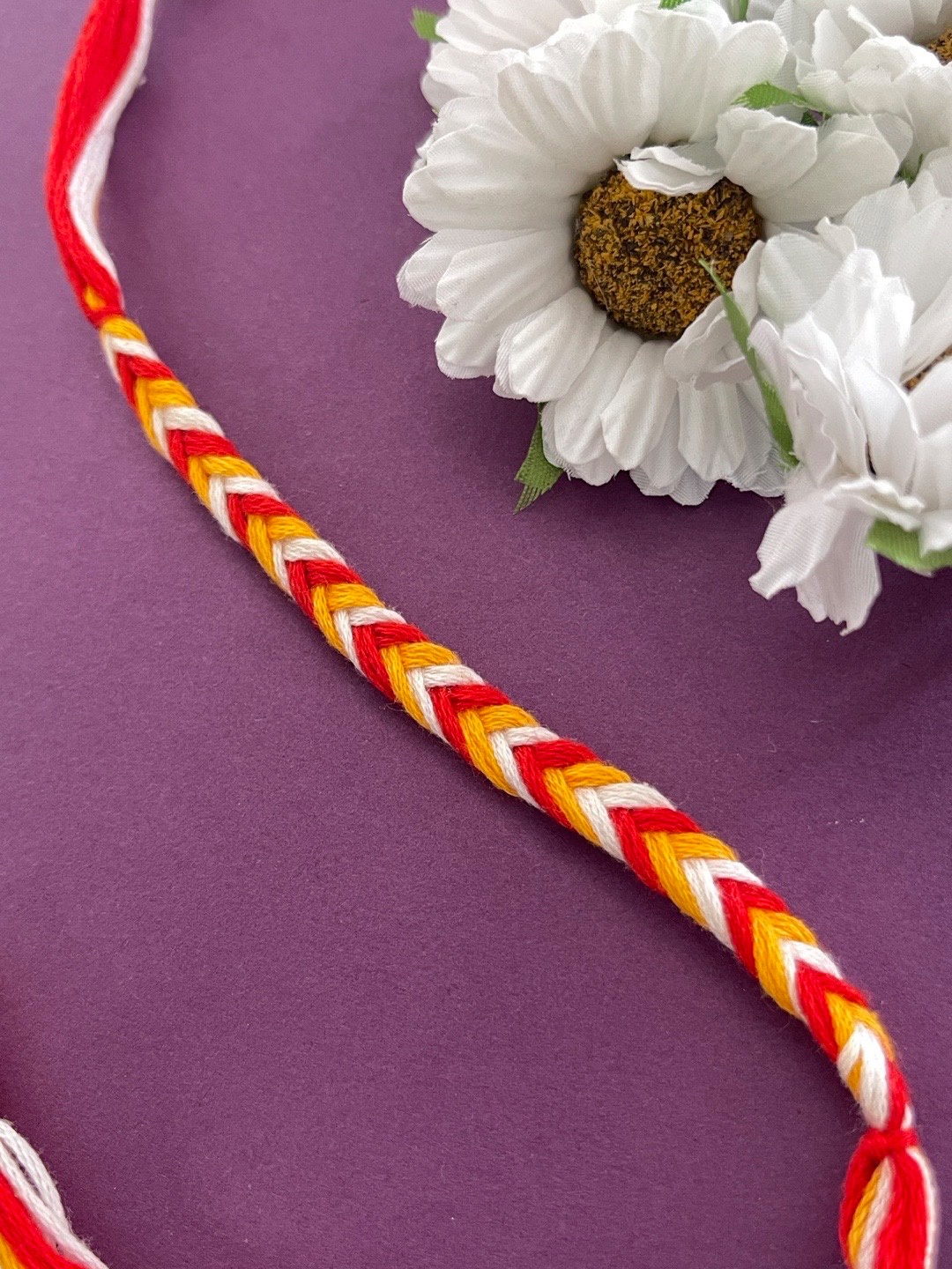 

Digital Dress Room Men Red & Yellow Braided Thread Rakhi