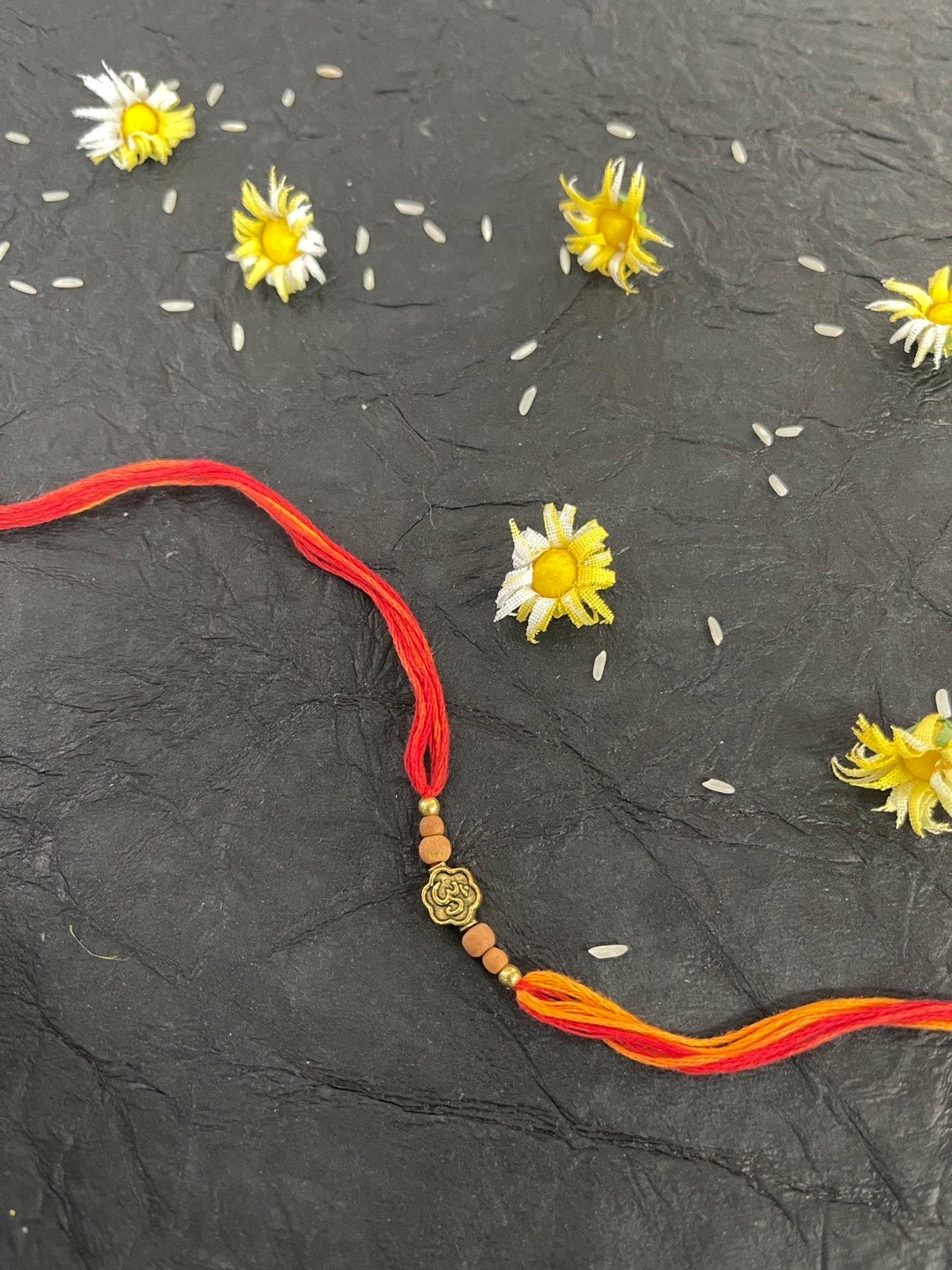 

Digital Dress Room Men Red & Gold-Toned Om Rakhi