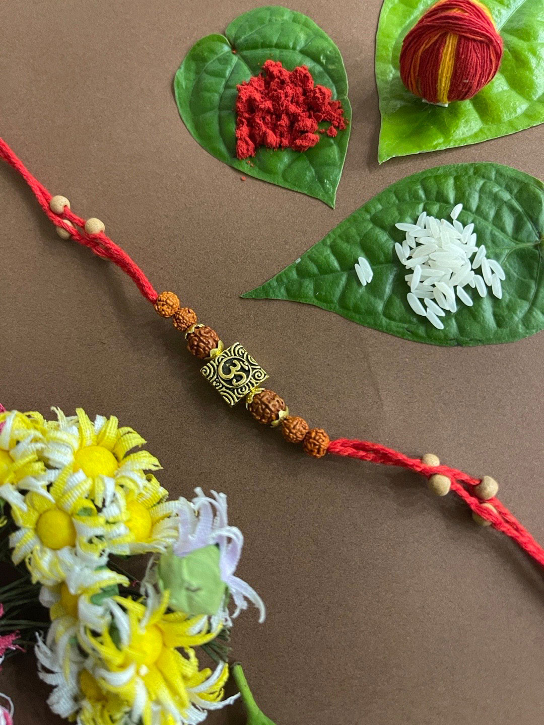 

Digital Dress Room Men Red & Brown Beaded Rakhi