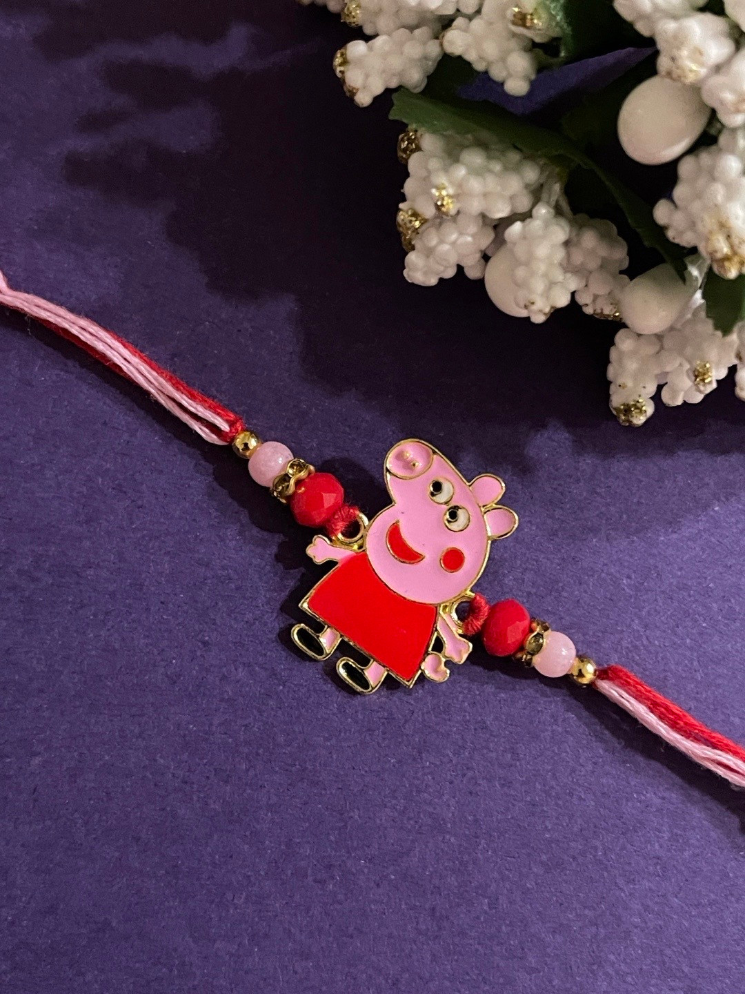 

Digital Dress Room Boys Red & Pink Peppa Pig Cartoon With Crystal Beads Rakhi