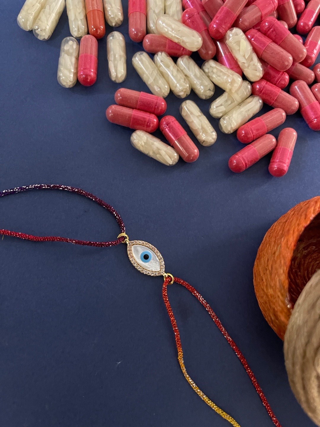 

Digital Dress Room Men Red & White AD-Studded Evil Eye Rakhi