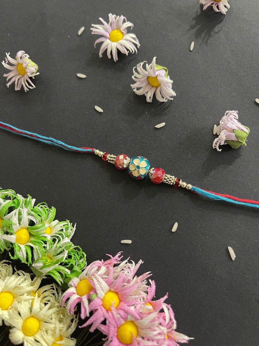 

Digital Dress Room Men Blue & Red Beaded Rakhi