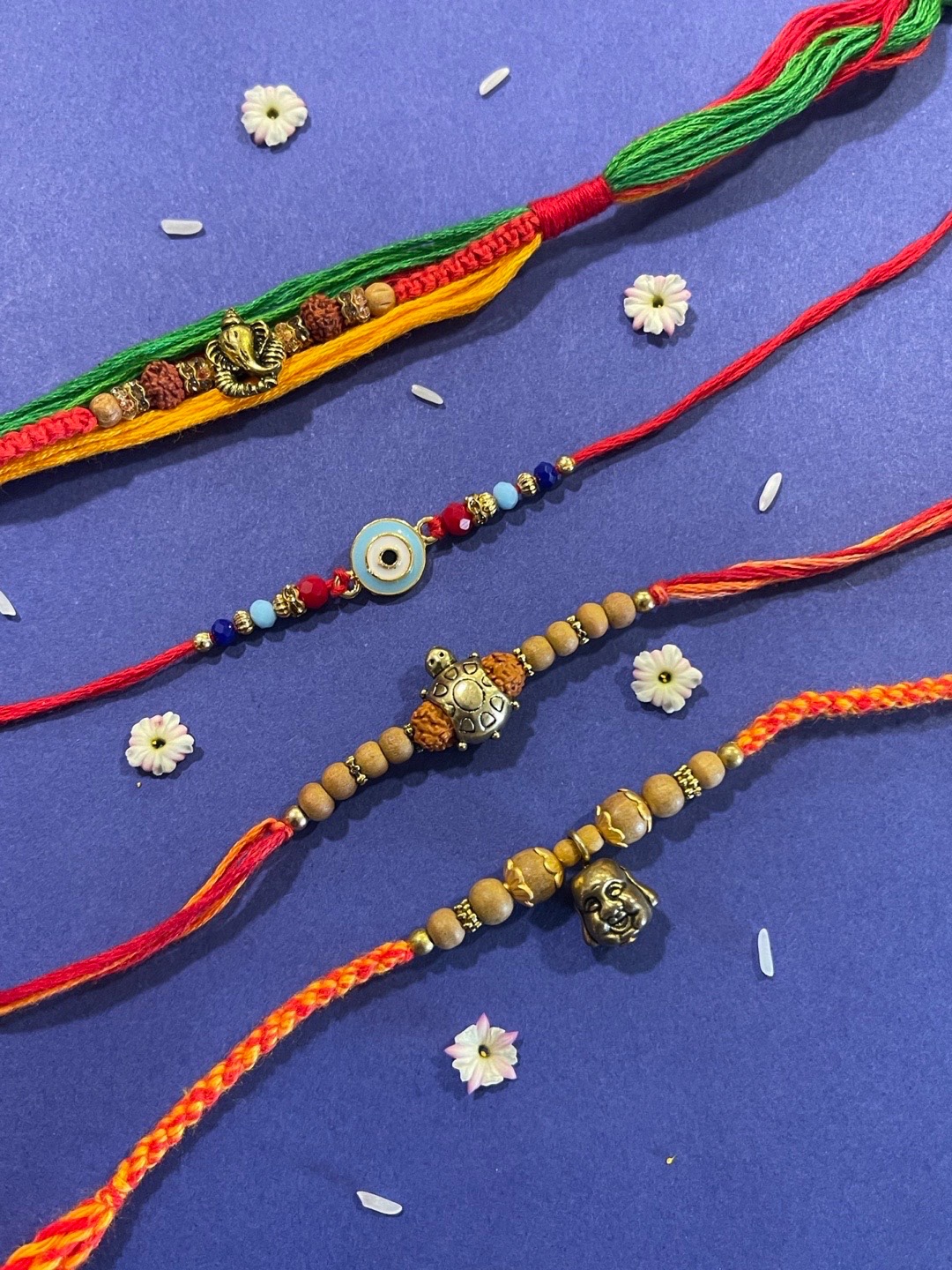 

Digital Dress Room Men Set of 4 Red & Gold Pendant Rakhi