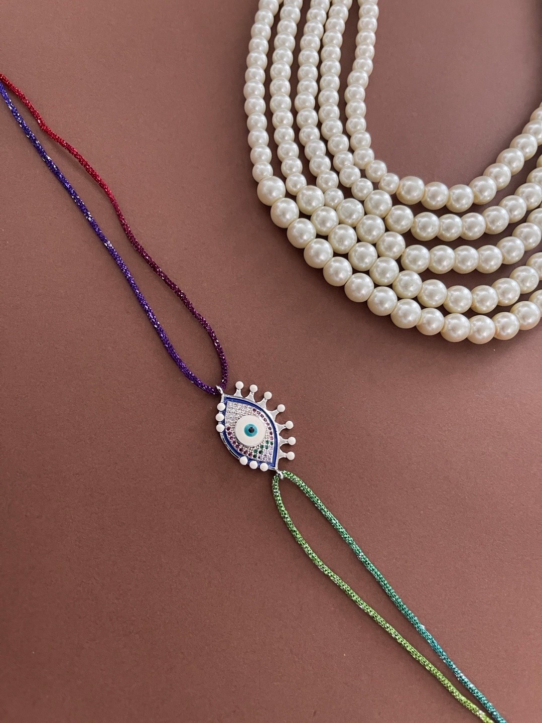 

Digital Dress Room Men White American Diamond-Studded Evil Eye Rakhi