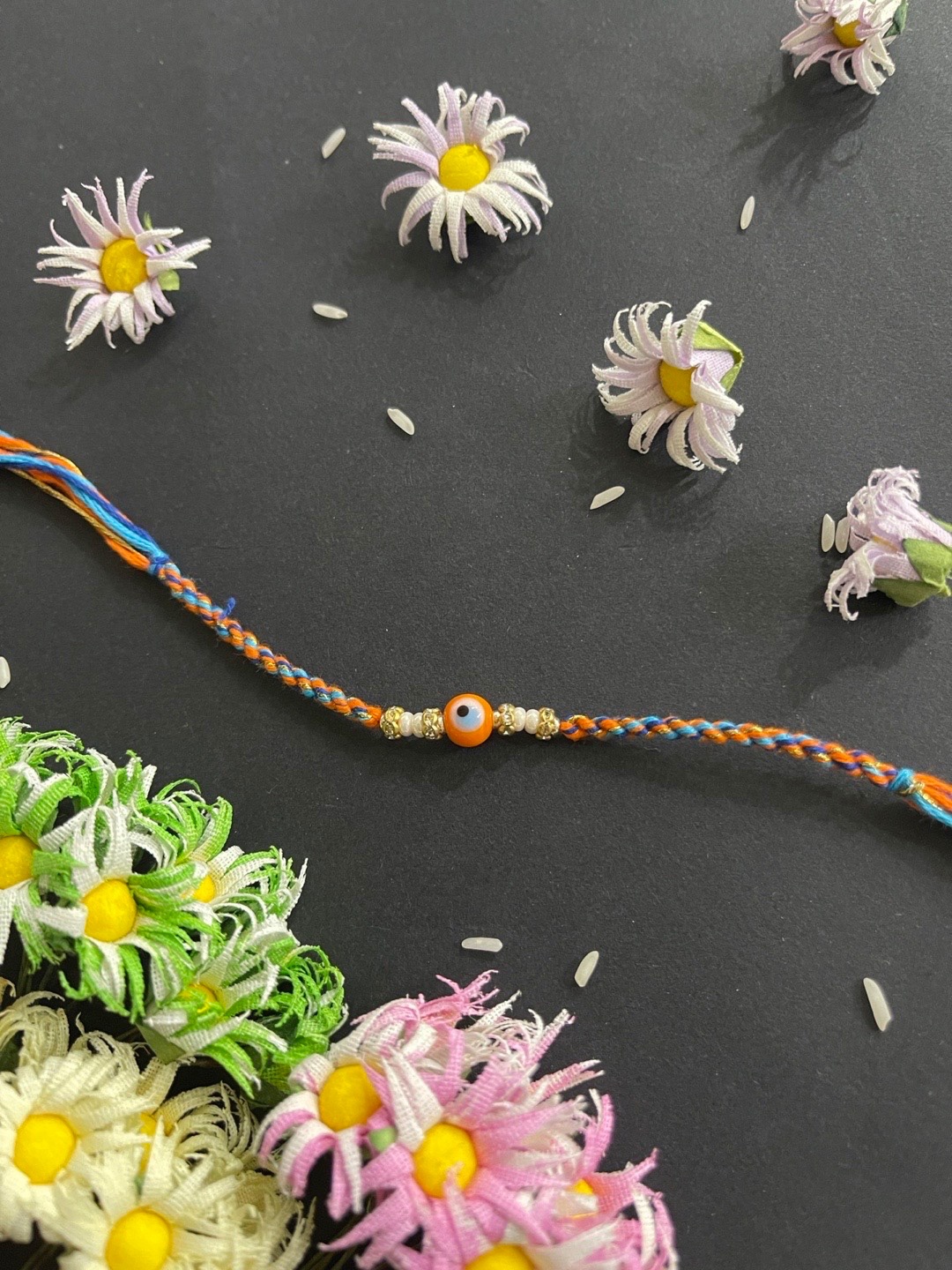 

Digital Dress Room Men Orange & Blue Beaded Thread Rakhi