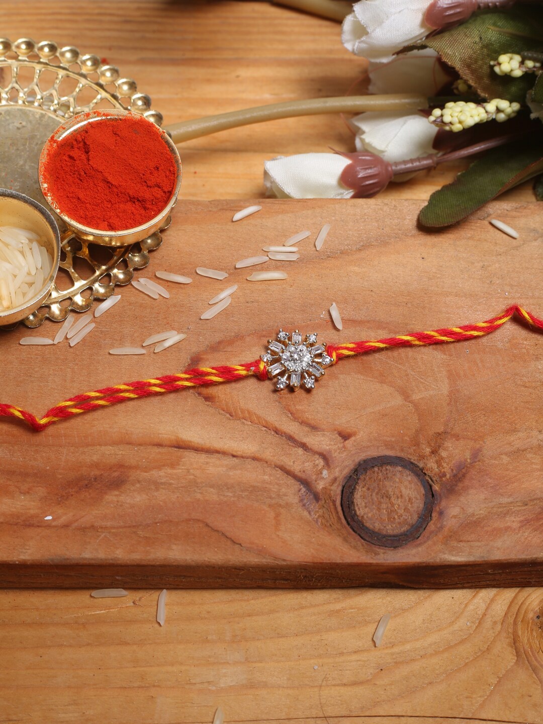 

Aapno Rajasthan Red Stone-Studded Rakhi