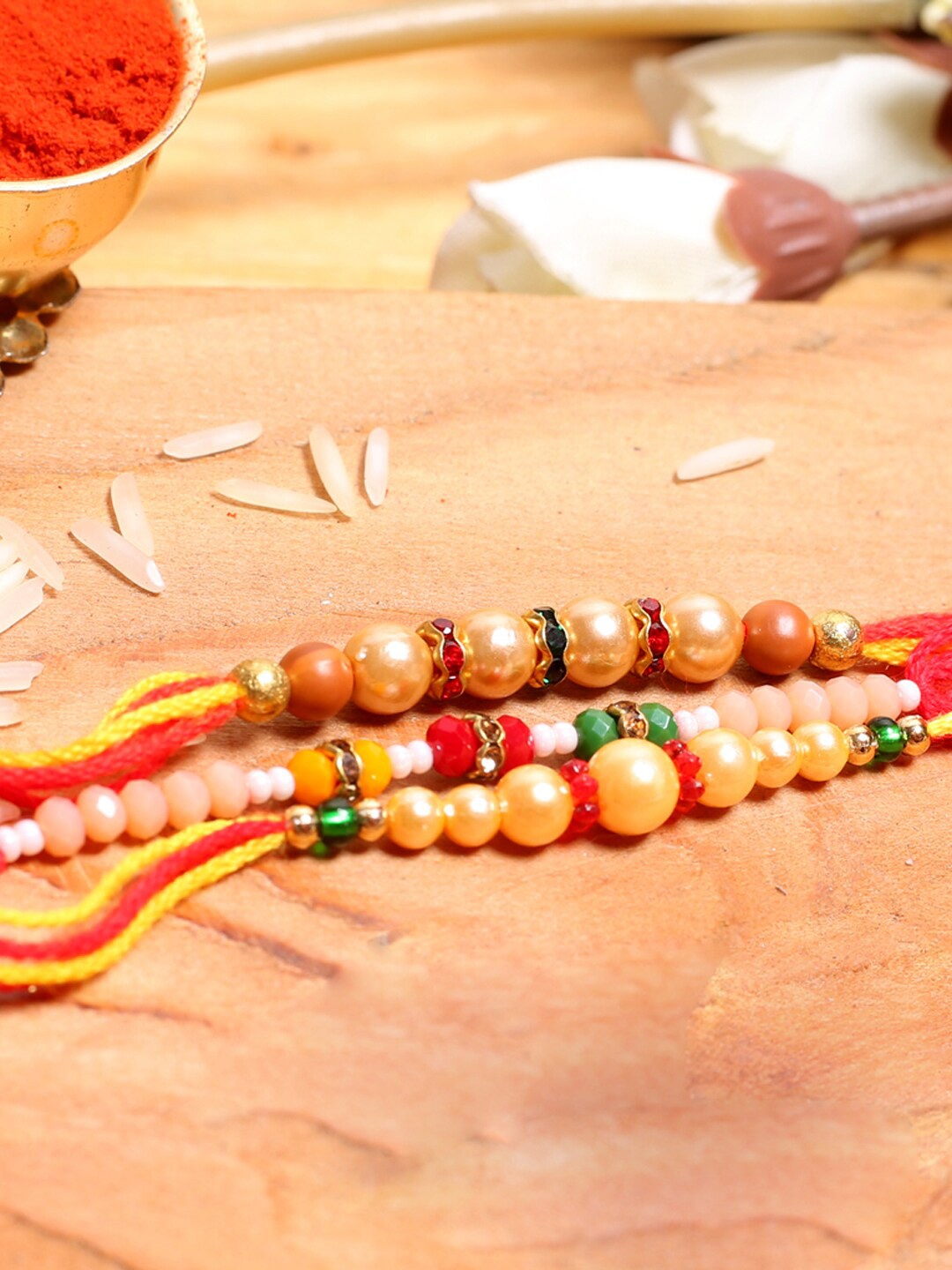 

Aapno Rajasthan Handcrafted Golden Beaded Set of 3 Mauli Rakhi with Roli Chawal Pack, Multi