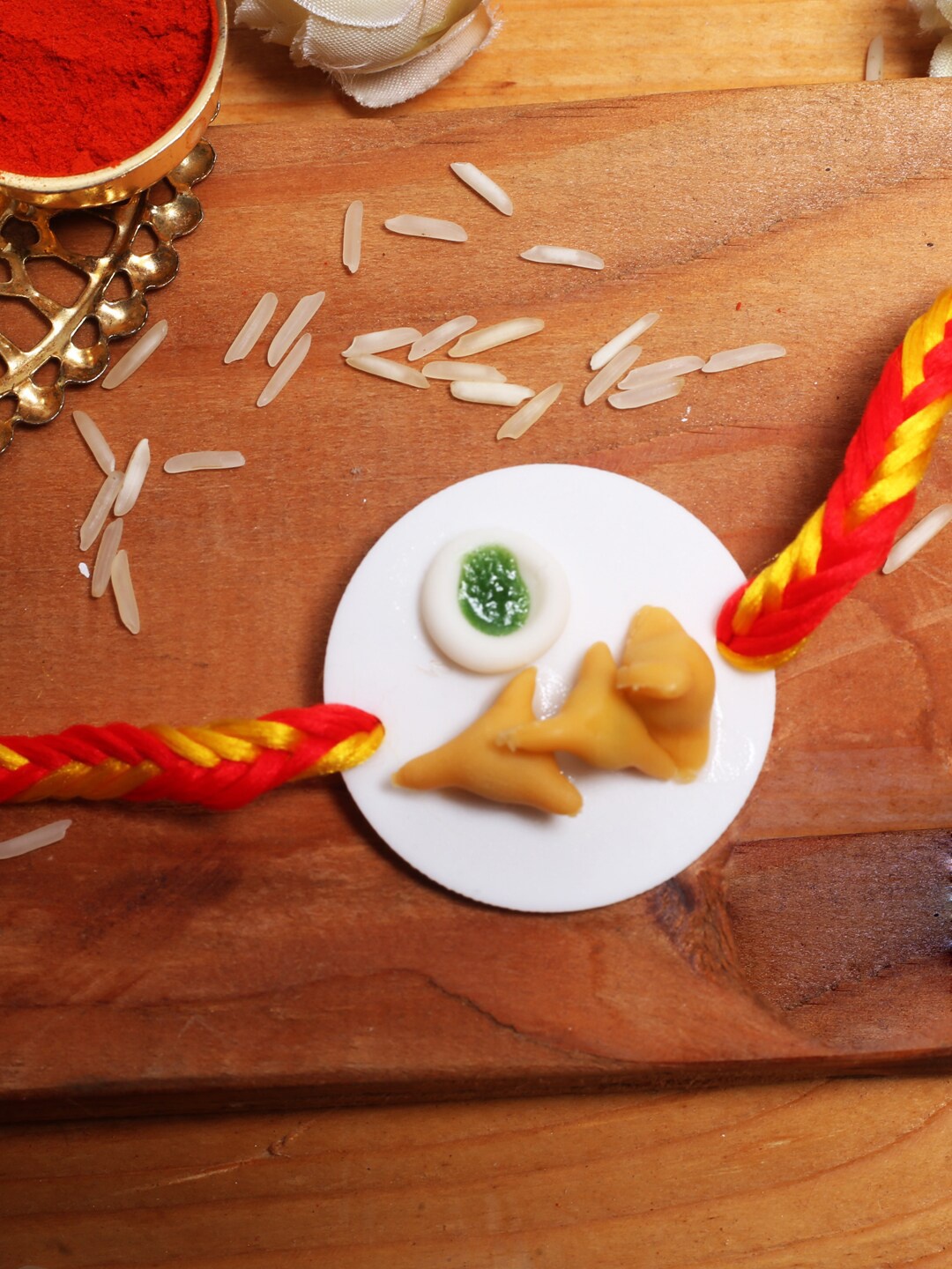 

Aapno Rajasthan Kids Multicoloured Tasty Samosa Rakhi, Multi