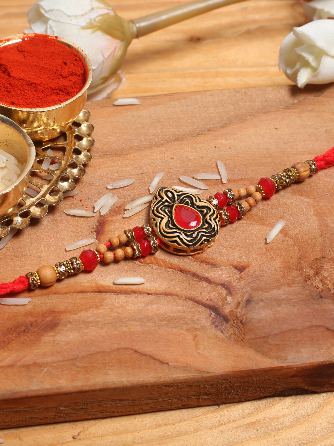 

Aapno Rajasthan Red Embellished Beaded Rakhi Roli Chawal & Card