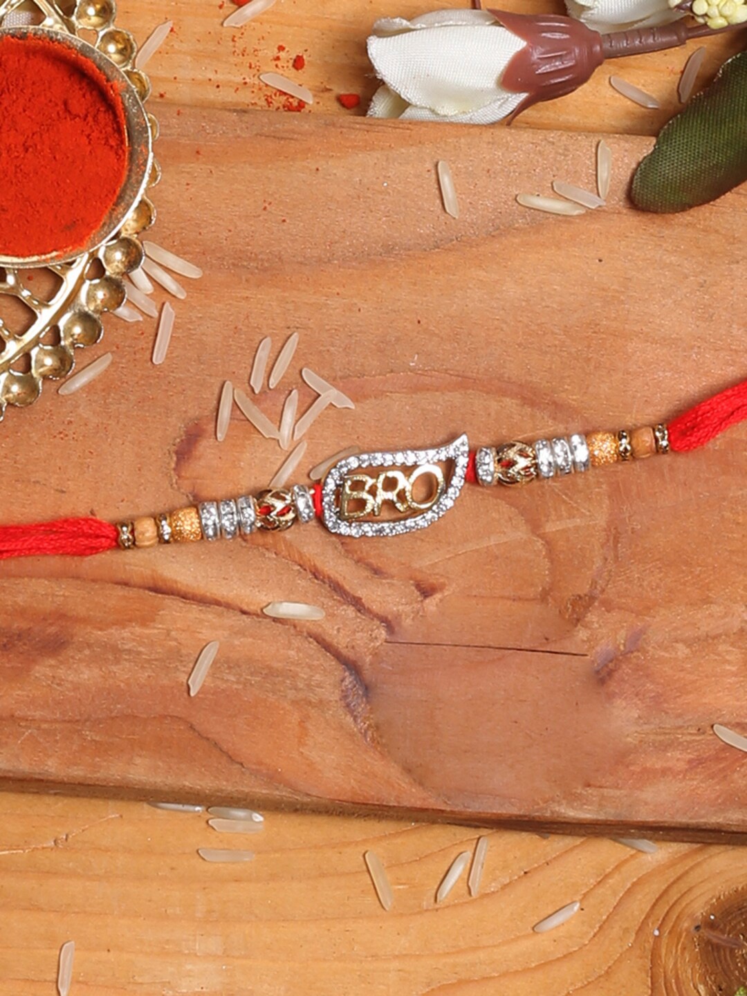 

Aapno Rajasthan Red & Silver-Toned Stone-Studded Bro Rakhi