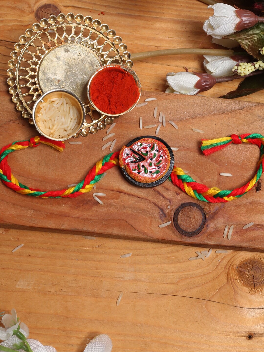 

Aapno Rajasthan Kids Multicoloured Veggie Pizza Rakhi, Multi
