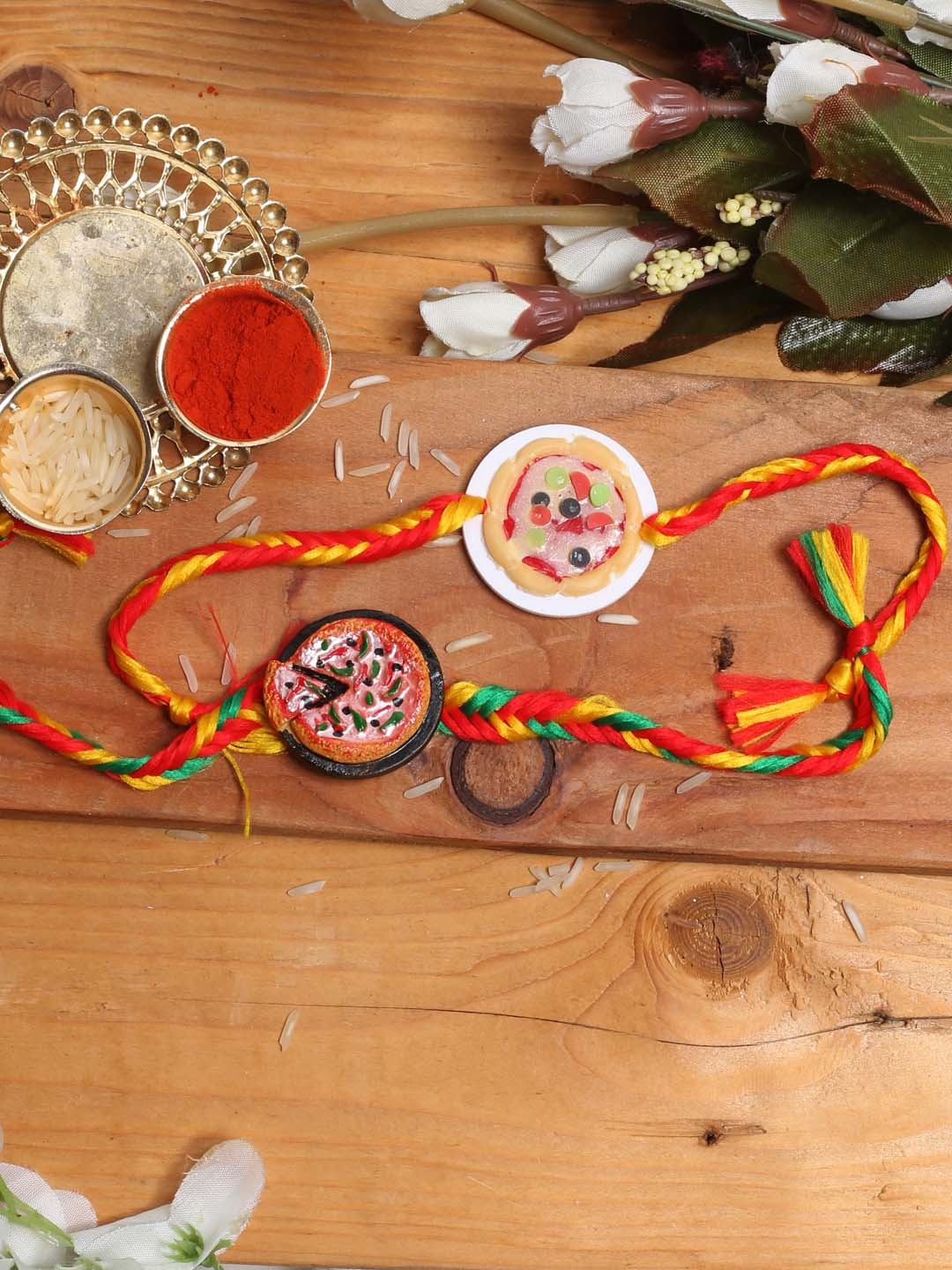 

Aapno Rajasthan Pack Of 2 Multicoloured Colourful Pizza Rakhi Roli Chawal & Card, Multi