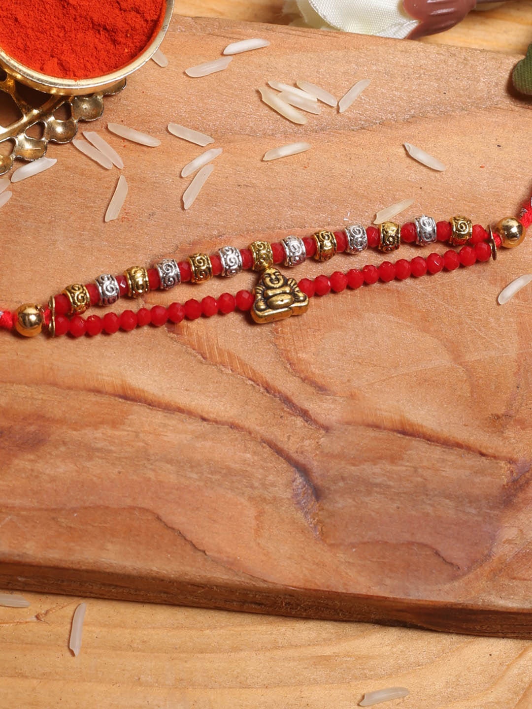 

Aapno Rajasthan Red Laughing Buddha Red Beaded Multistrand Rakhi