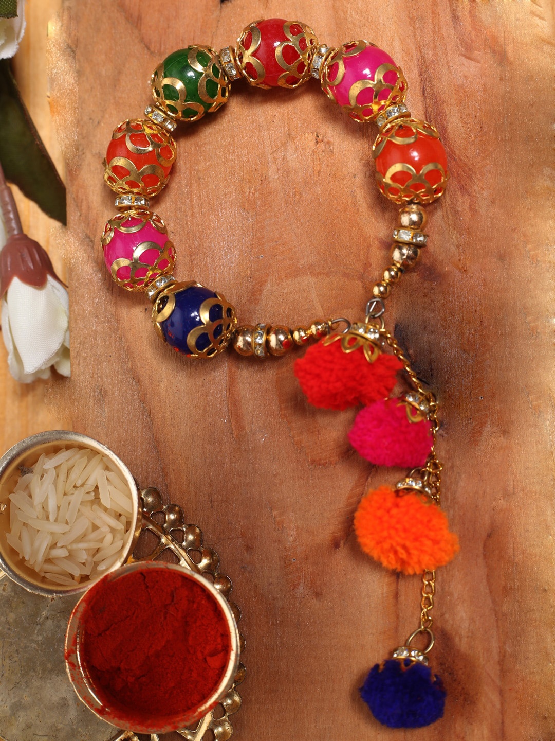 

Aapno Rajasthan Multicoloured Traditional Hath Phool Rakhi, Multi