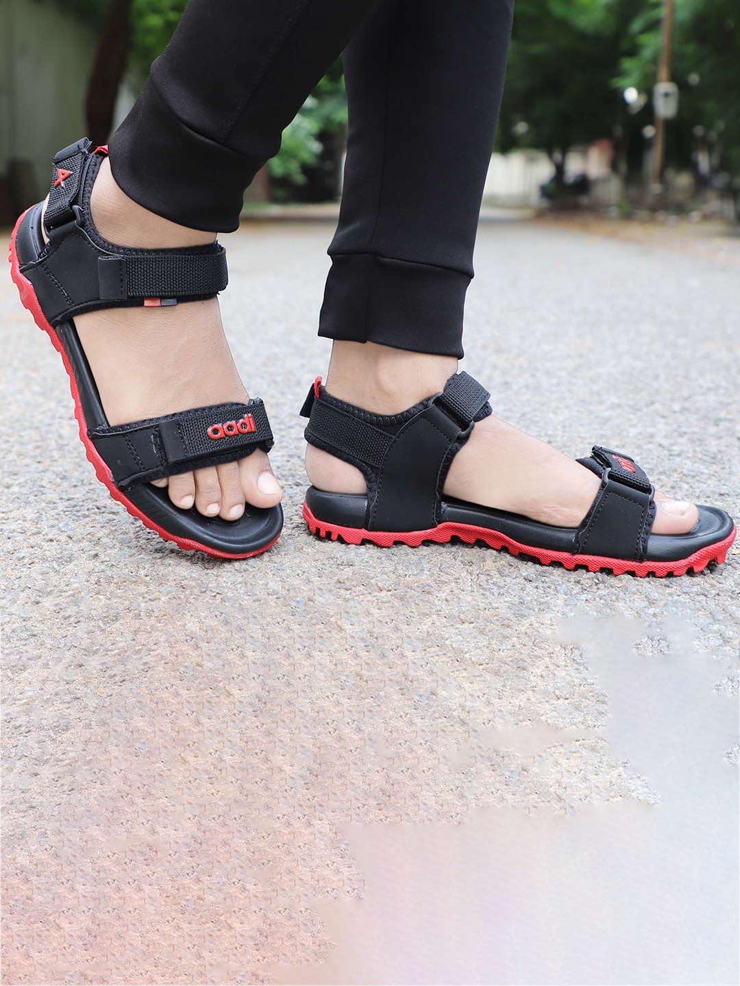 

aadi Men Black & Red Solid Sports Sandals