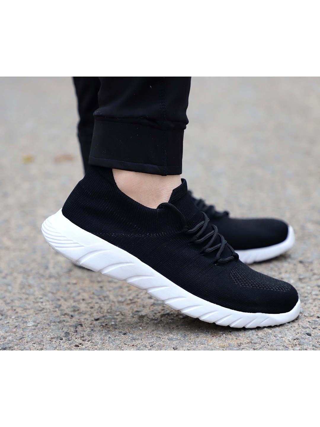 

aadi Men Black Sneakers