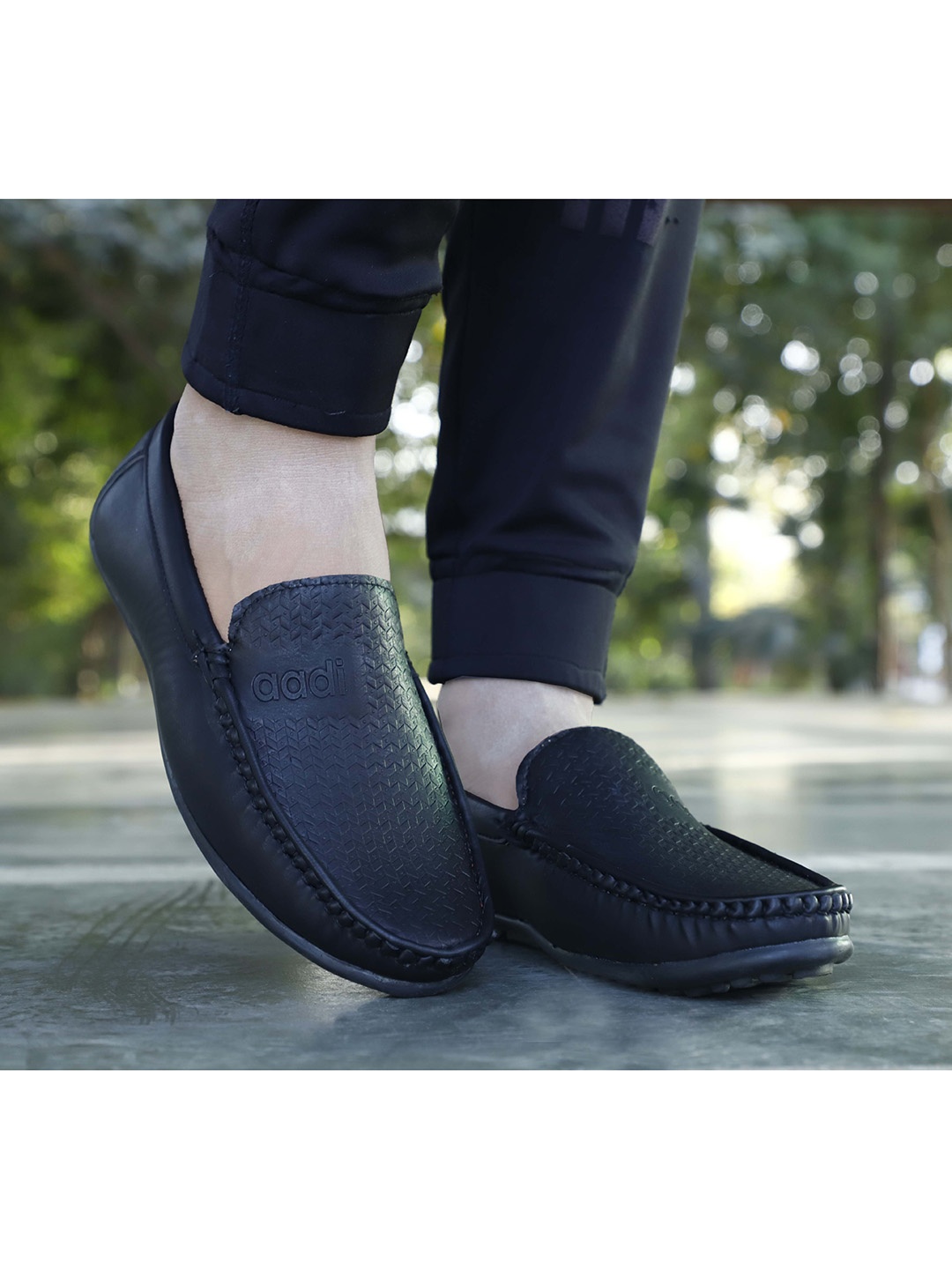 

aadi Men Black Perforations Loafers