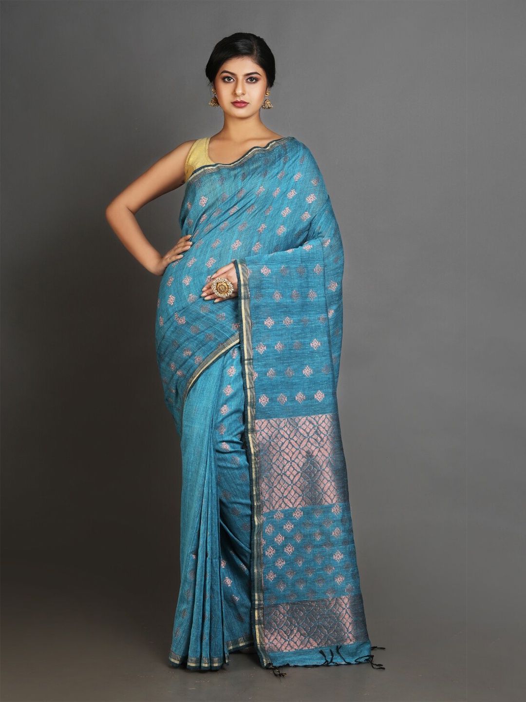 

Charukriti Teal & Gold-Toned Woven Design Zari Pure Linen Saree