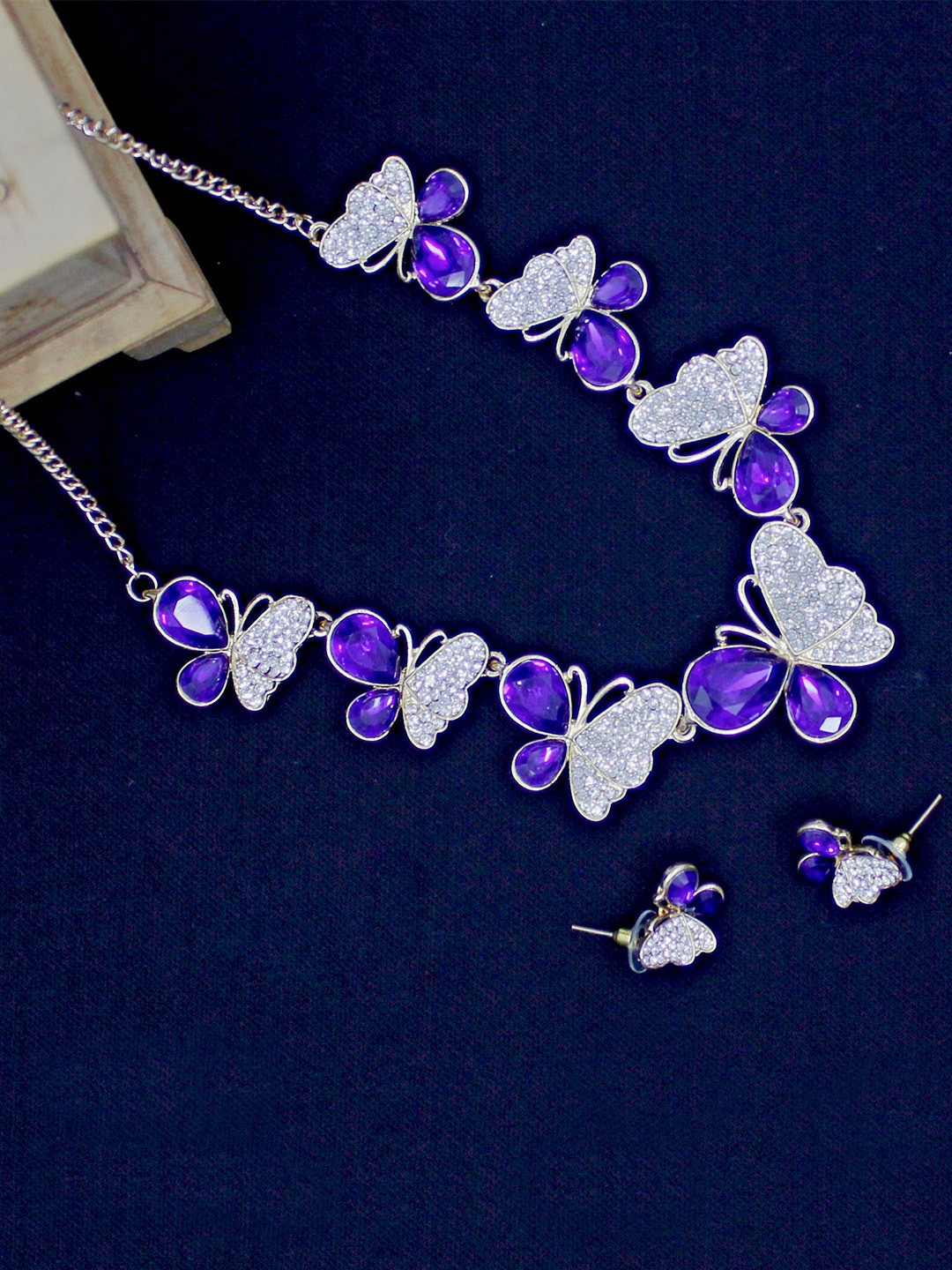 

SAIYONI Gold-Plated Blue Stone Studded Butterfly Choker Jewellery Set