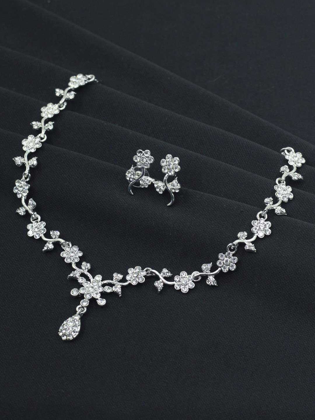 

SAIYONI Silver-Plated White AD-Studded Leaf & Flower Shaped Jewellery Set