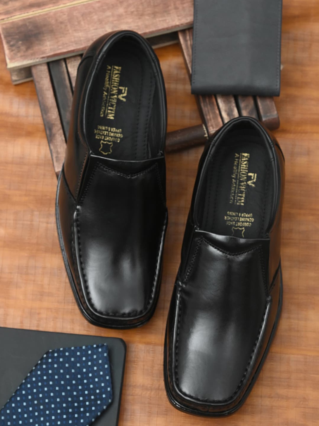 

Fashion Victim Men Black Solid Leather Formal Slip-Ons