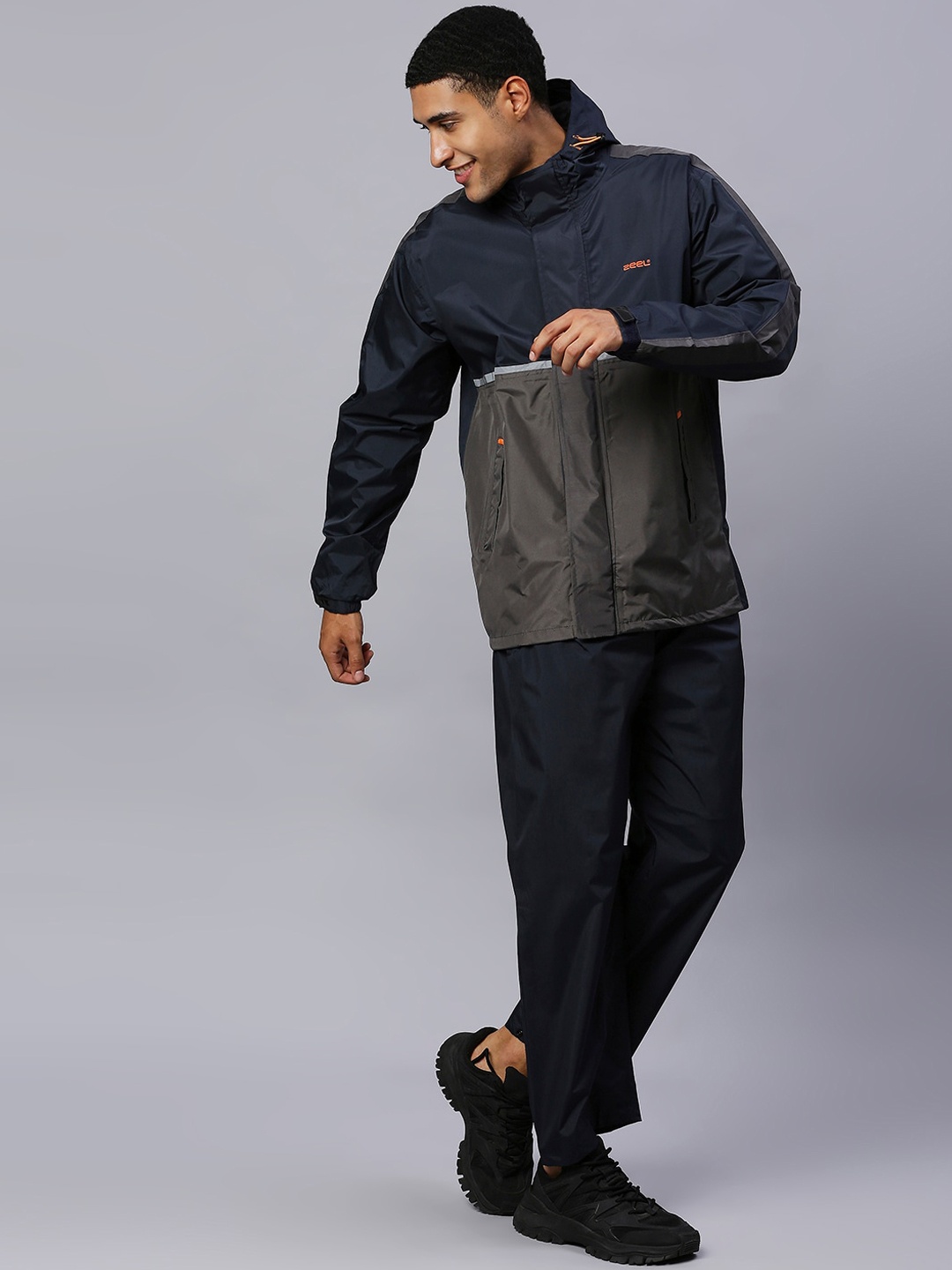 

Zeel Men Navy Blue Solid Rain Suit