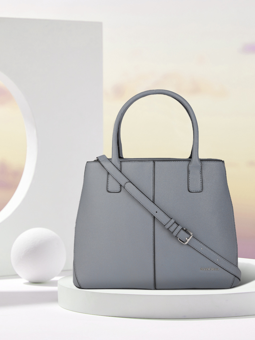 

Allen Solly Blue Solid Structured Handheld Bag