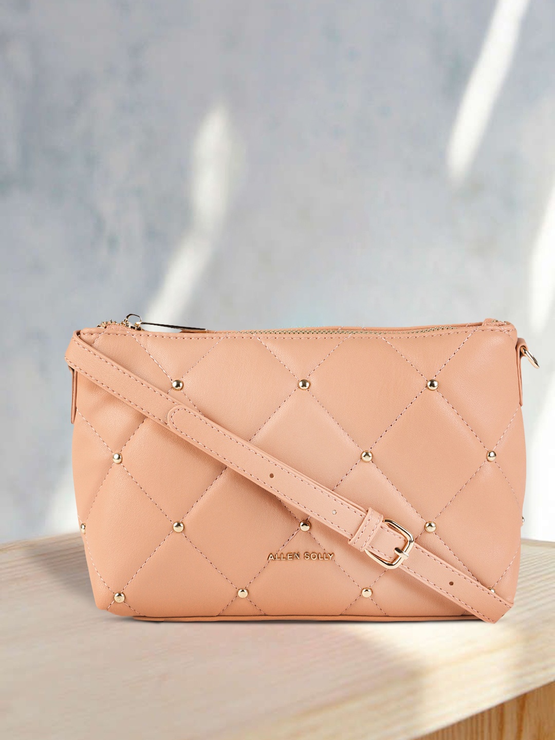 

Allen Solly Pink Quilted Sling Bag