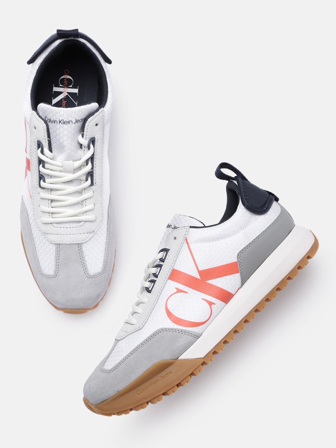 

Calvin Klein Men White Solid Sneakers