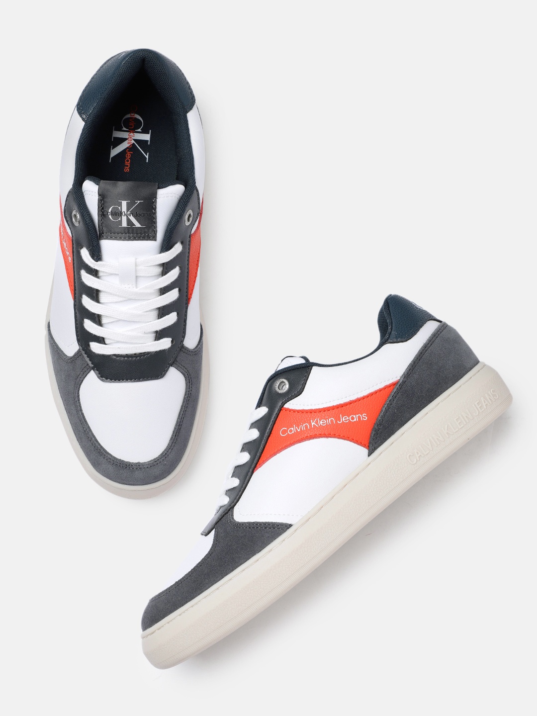 

Calvin Klein Men White & Orange Colourblocked Leather Sneakers
