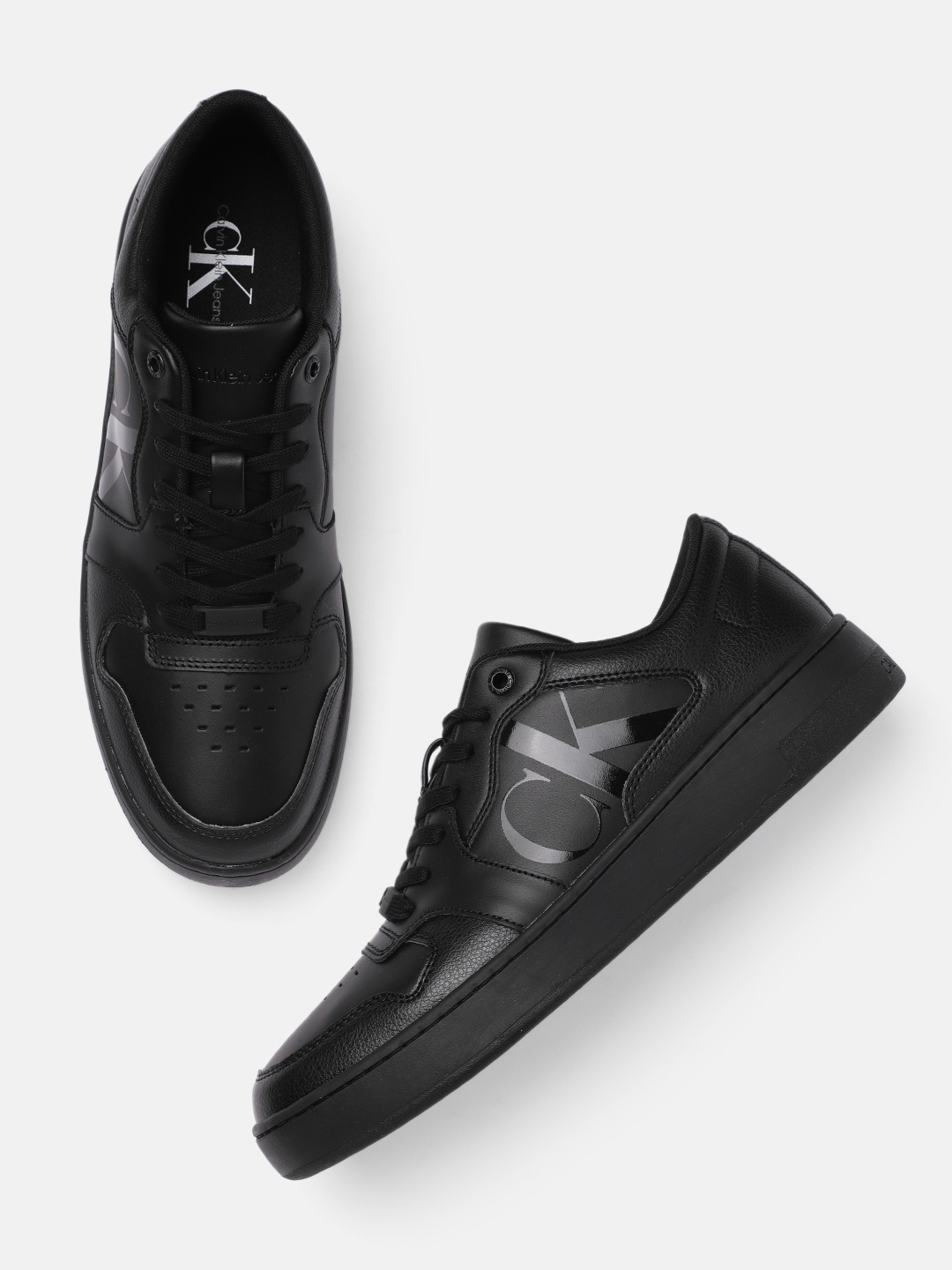 

Calvin Klein Men Black Solid Sneakers