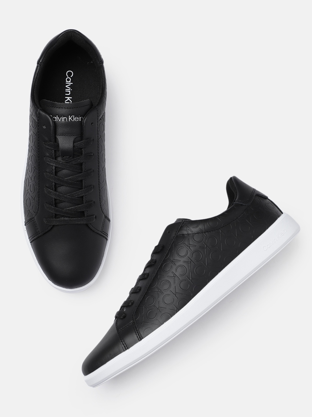 

Calvin Klein Men Black Brand Logo Self-Print Leather Sneakers