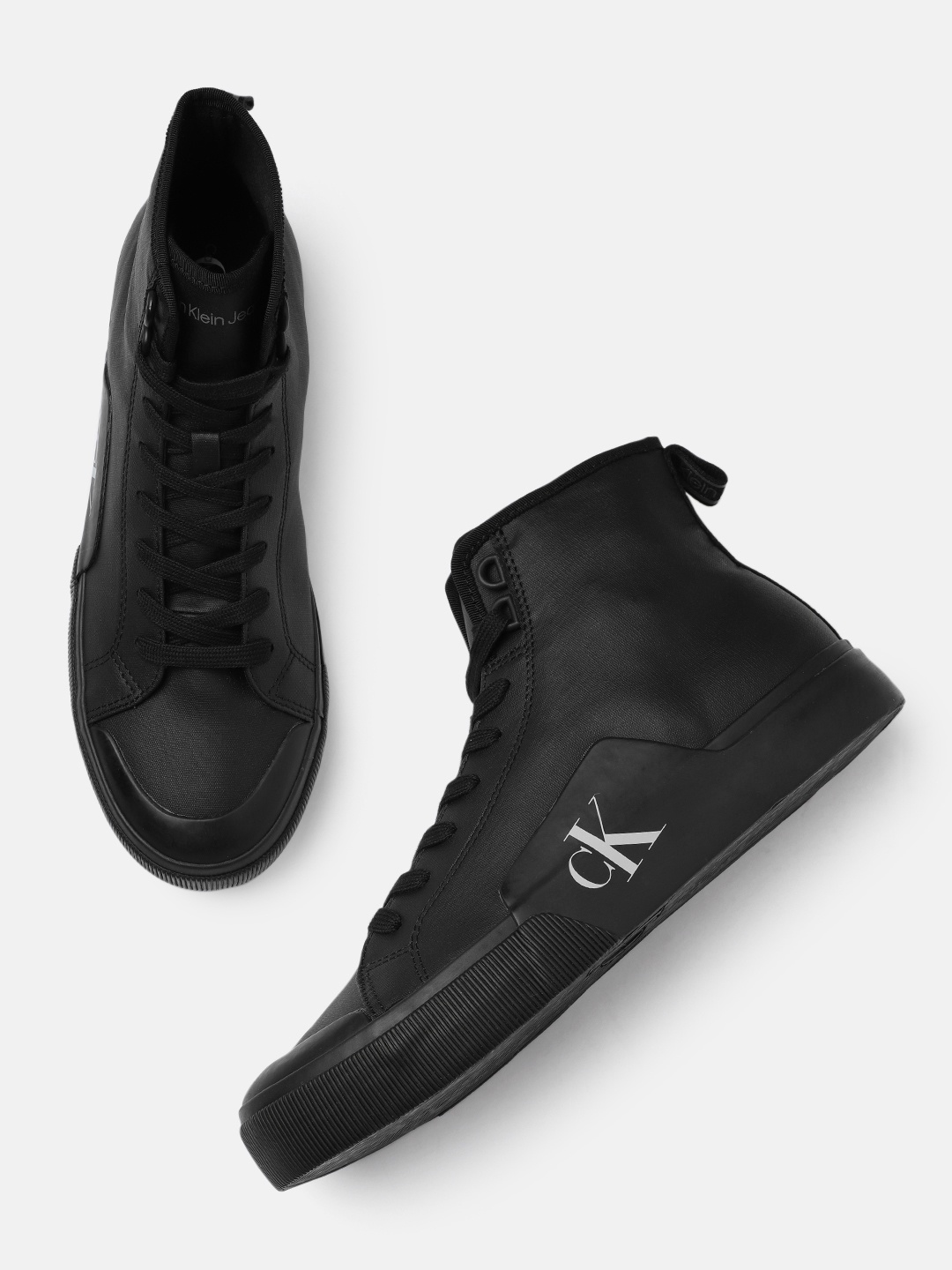 

Calvin Klein Men Black SKATER VULCANIZED Mid-Top Sneakers