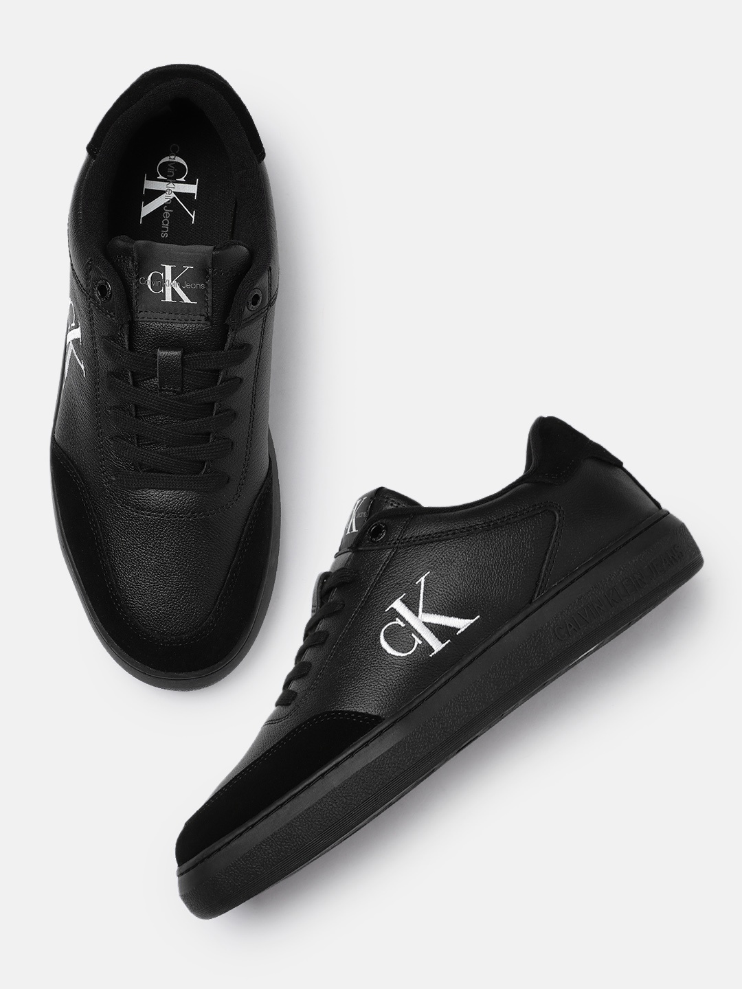 

Calvin Klein Men Black Brand Logo Print Leather Sneakers