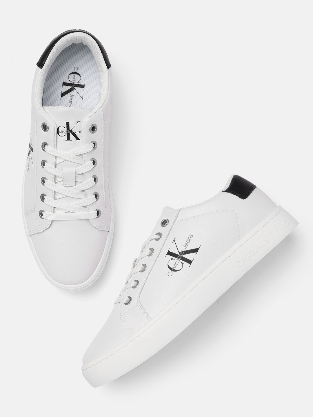 

Calvin Klein Men White Solid Leather Regular Sneakers With Brand Logo Print Detail