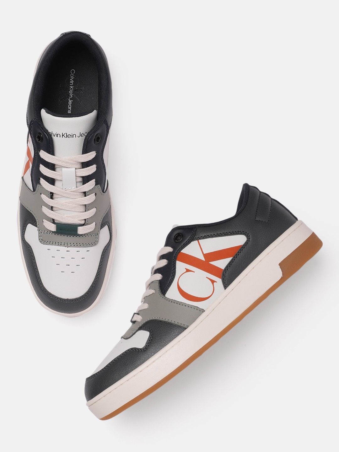 

Calvin Klein Men White Colourblocked PU Sneakers