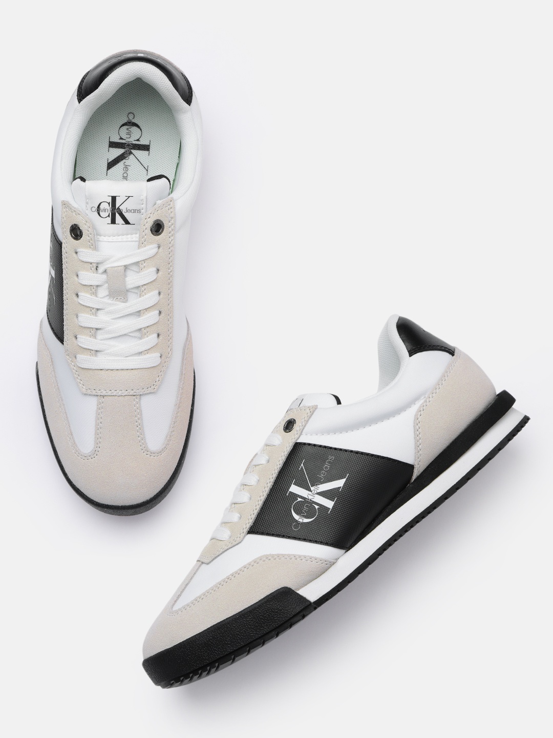 

Calvin Klein Men White & Black Colourblocked Sneakers