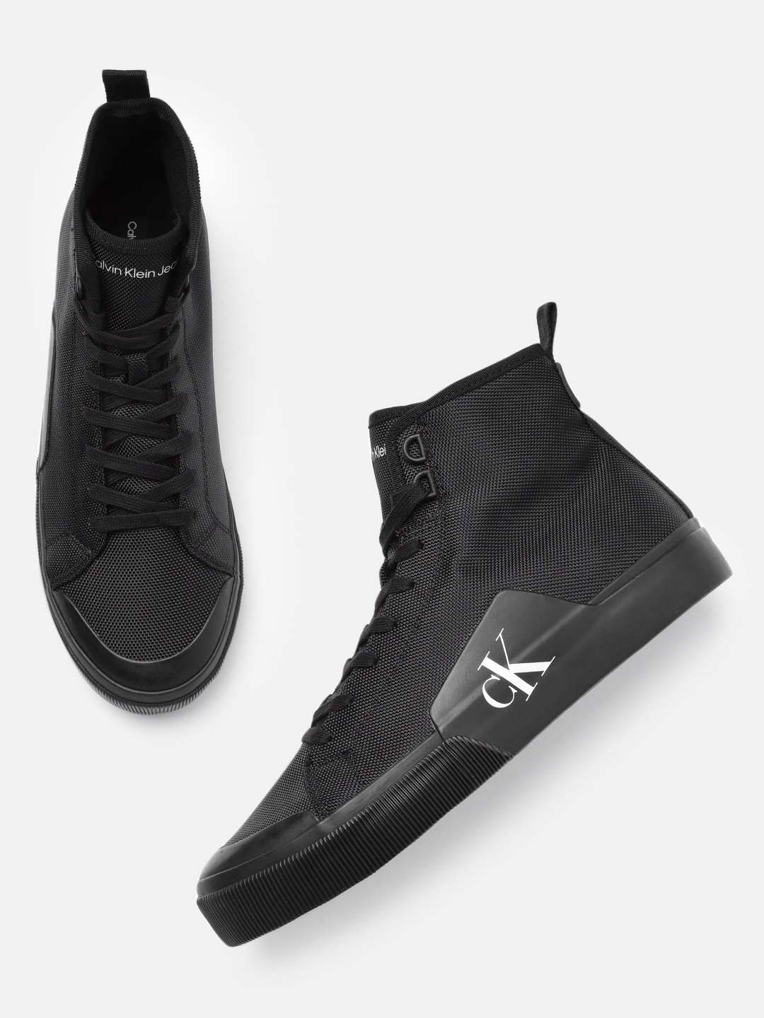 

Calvin Klein Men Black SKATER VULC Mid-Top NY Sneakers