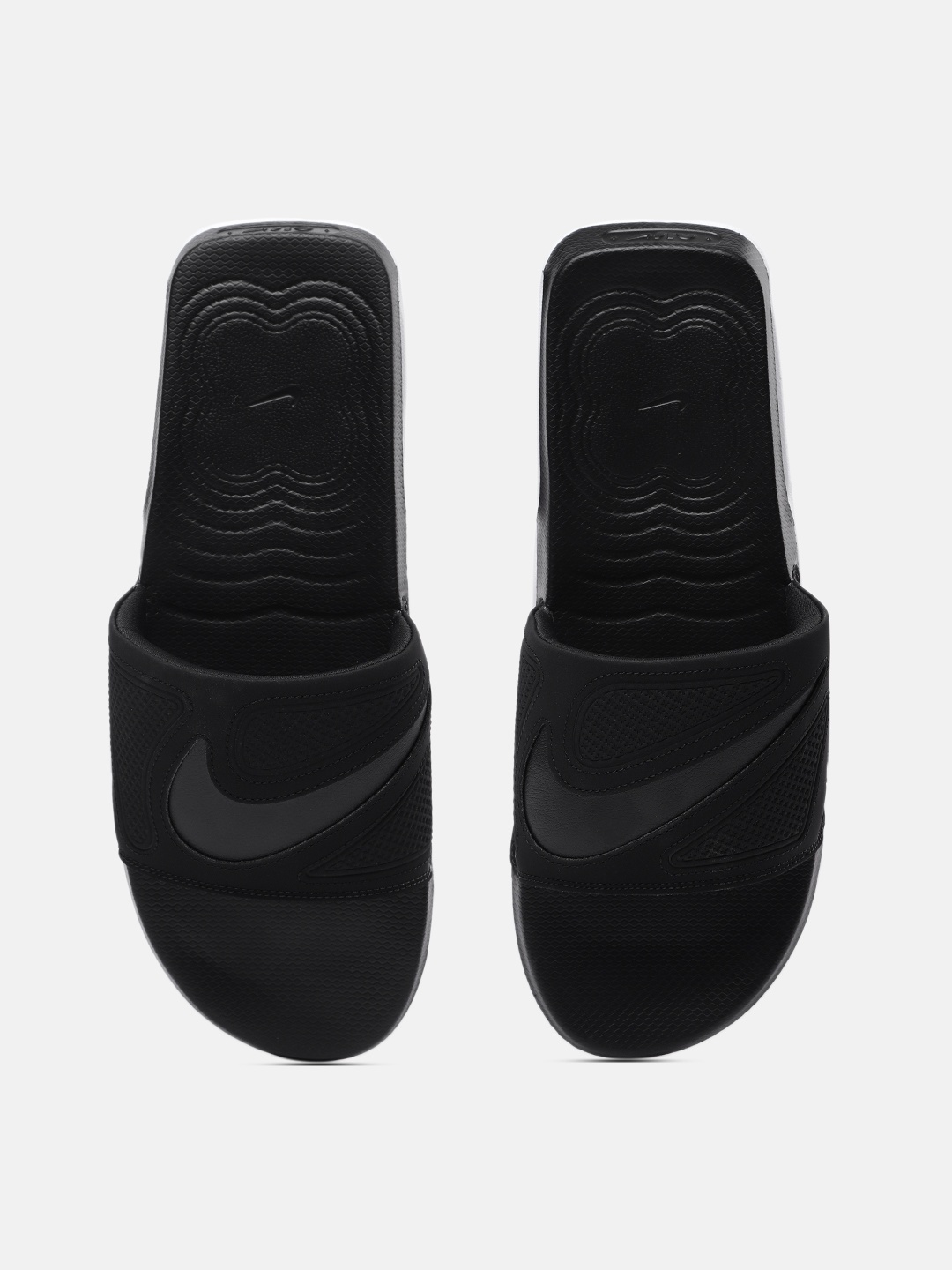 

Nike Men Black Solid Sliders