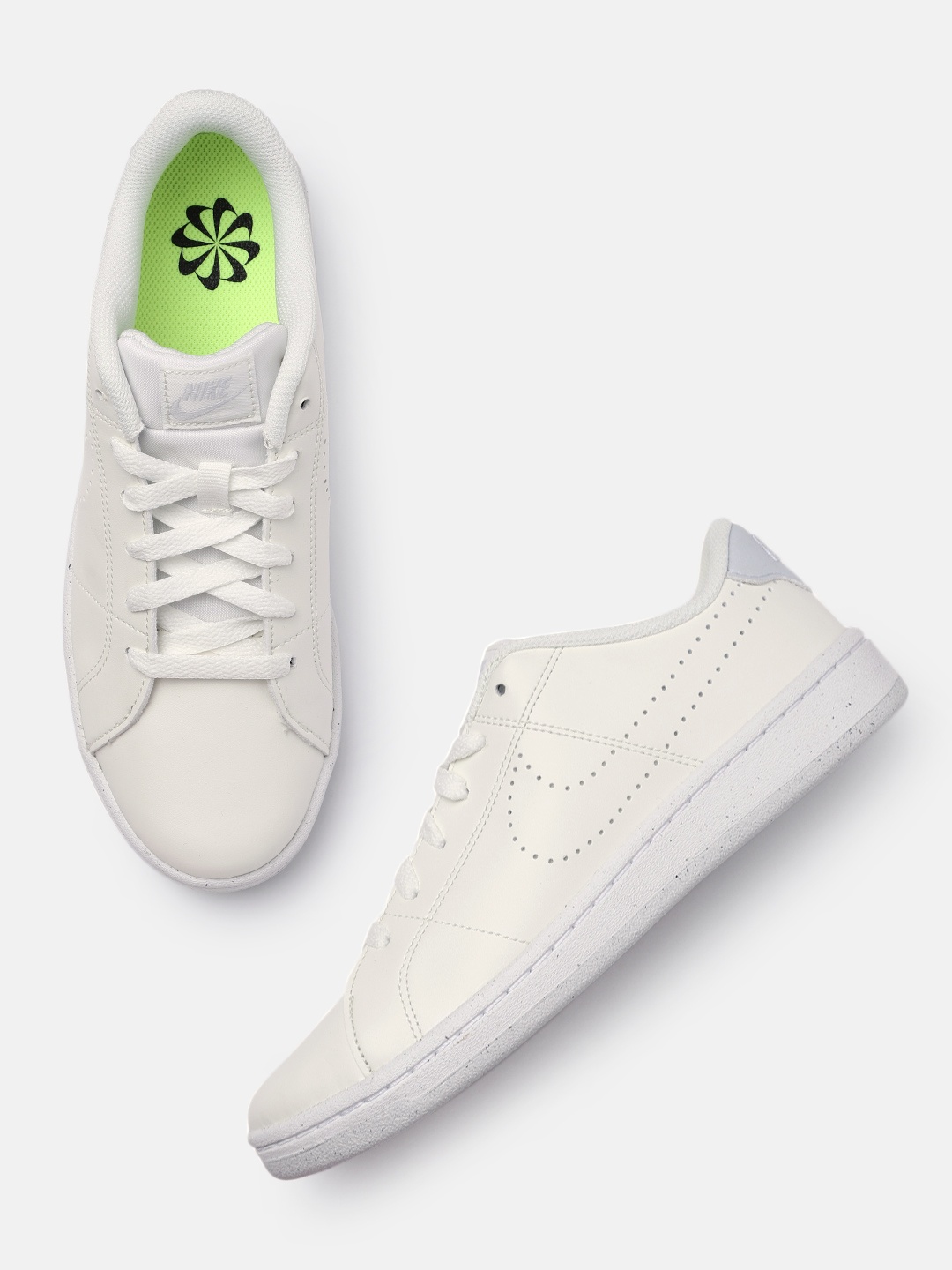 

Nike Women White Solid Sneakers