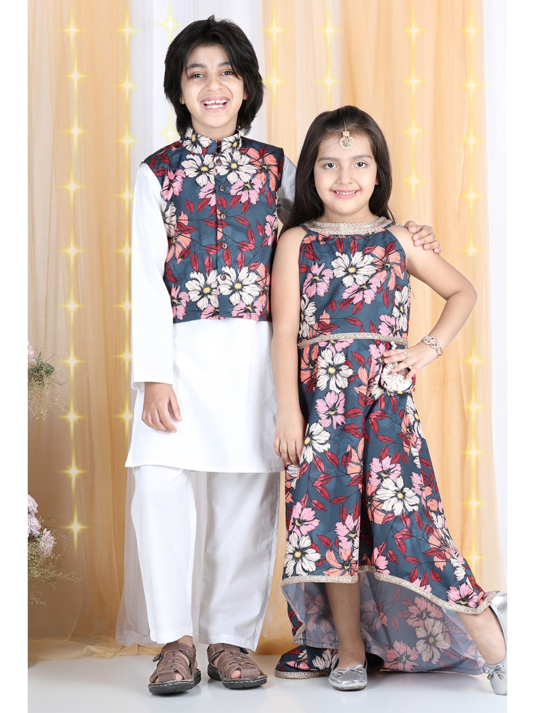 

Cutiekins Boys White & Black Solid Kurta Pyjamas With Tribal Printed Waistcoat