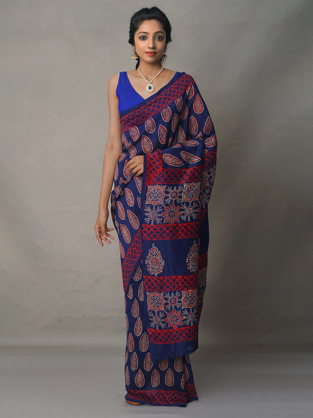 

Unnati Silks Navy Blue & Rust Ethnic Motifs Silk Cotton Chanderi Saree